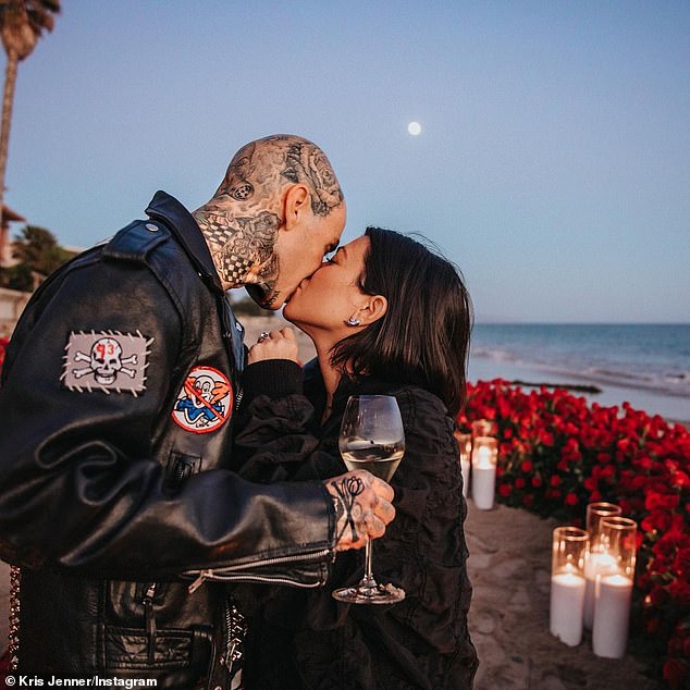 Engaged: Just eight months after going public with their relationship, Travis got down on one knee in October to ask Kourtney for her hand in marriage