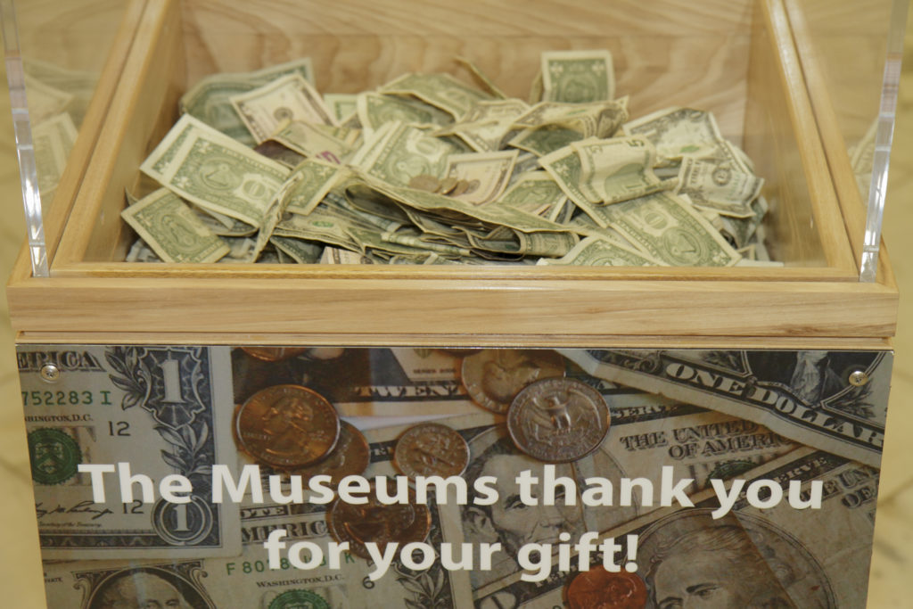 Donation box inside the National Portrait Gallery. (Photo by: Jeffrey Greenberg/Universal Images Group via Getty Images)