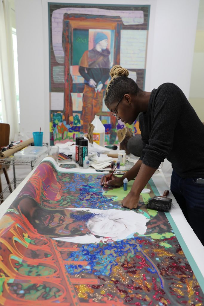 Amani Lewis in the studio. Photo: Albert Grant.