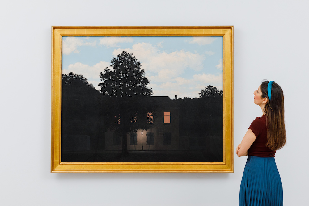 Rene Magritte, L’empire des lumières (1961) . Image courtesy Sotheby's.