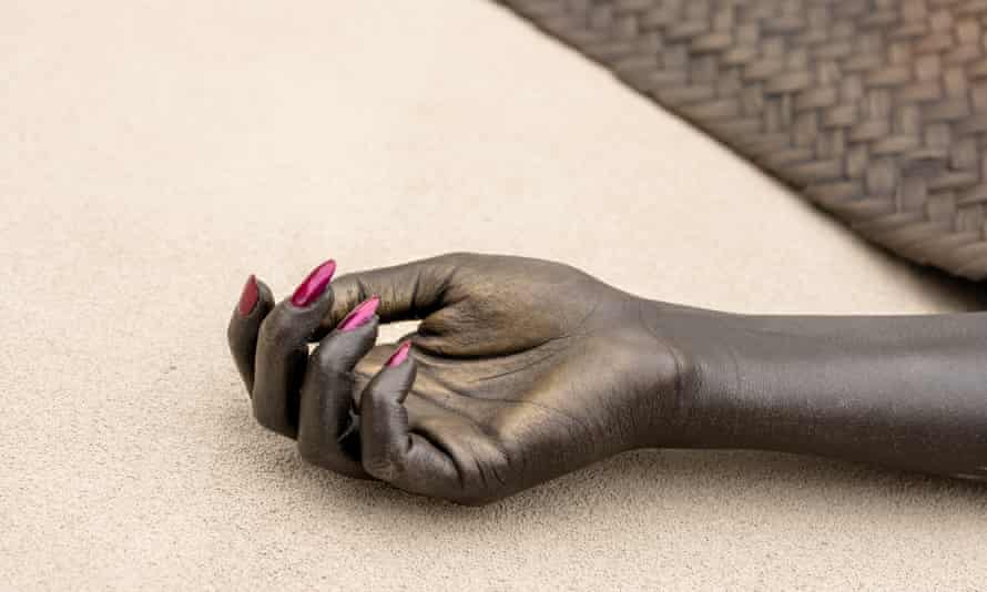 Shavasana I and Shavasana II are bronze figures of Black women underneath woven yoga mats.