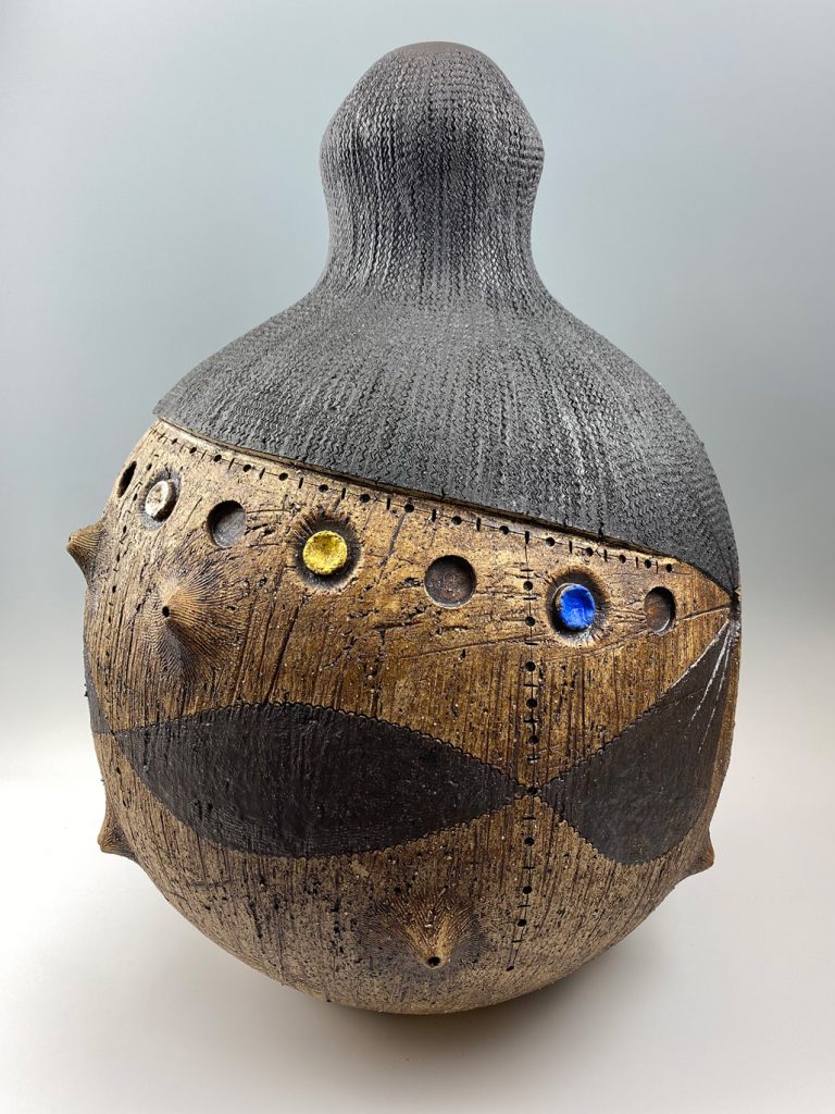 Simphiwe Mbunyuza, “ Iselwa”, 2021,  Leather, steel on ceramic 30